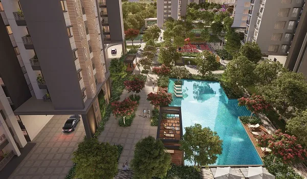 Landscaped pool zone beside the central clubhouse at Sattva Courtyard, East Bengaluru
